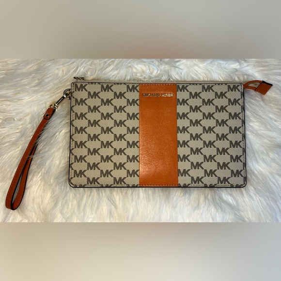 Michael Kors, orange and tan clutch with zipper. In great condition. LIKE NEW!! - Picture 1 of 13